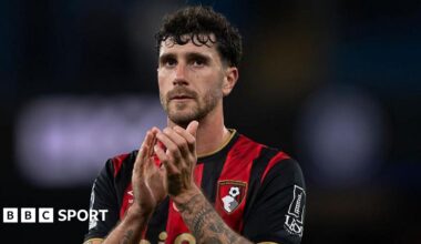 Marcos Senesi applauds Bournemouth fans after a game at Manchester City in November 2025