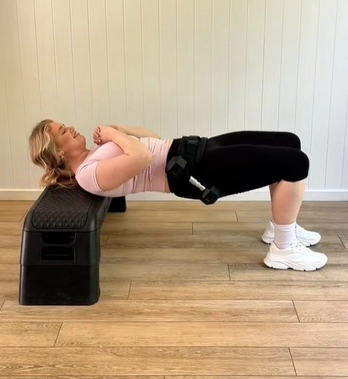 Hip thrusts are usually completed by the user positioning themselves upwards on a bench while balancing weights on their hips and thrusting upwards, which strengthens glute muscles.