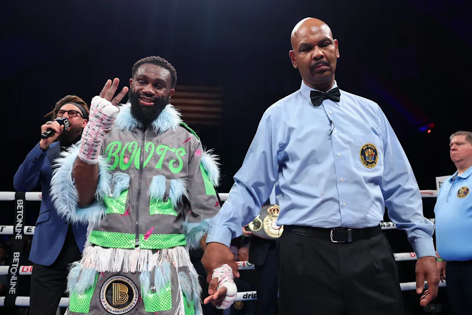 ATLANTIC CITY, NEW JERSEY - APRIL 12: Jaron Ennis (L) reacts after winning his fight against Eimantas Stanionis for the Ring Magazine, IBF world & WBA world welterweight titles at Jim Whelan Boardwalk Hall on April 12, 2025 in Atlantic City, New Jersey. (Photo by Mark Robinson/Matchroom Boxing/Getty Images)