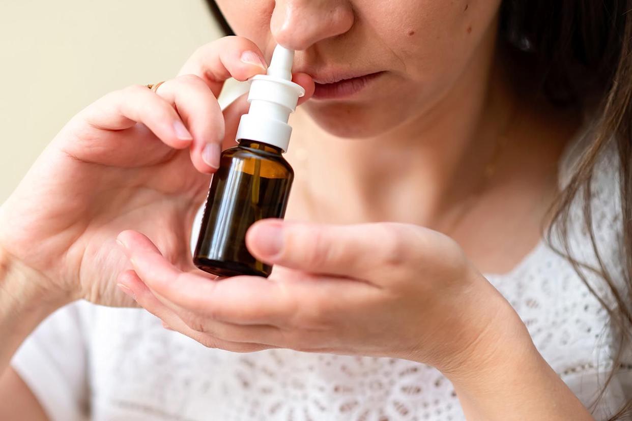 A woman using nasal spray (stock image).Credit: Getty