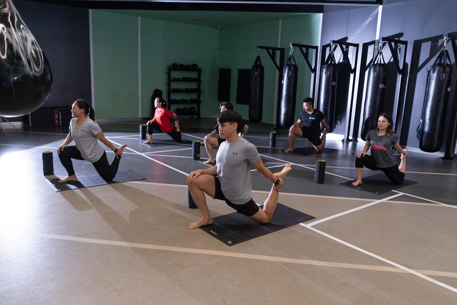 Recovery class ++++++++++++++++++++++ Published caption:: Stretching is part of the Recovery class.