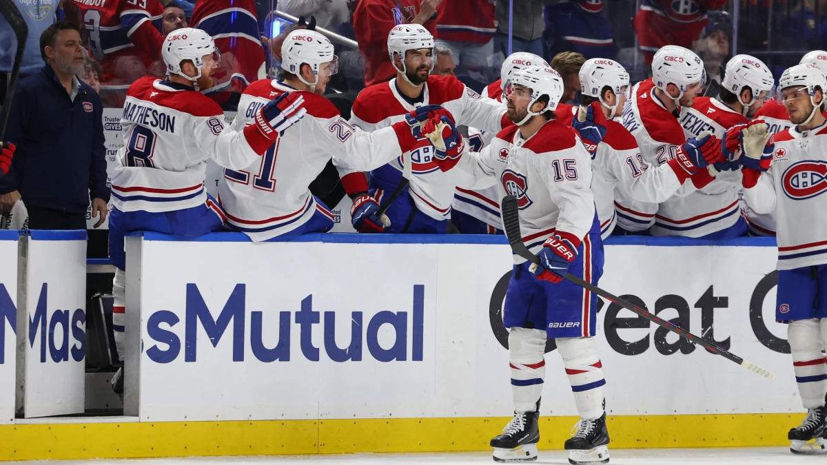 Montr&eacute;al Canadiens center Alex Newhook (15) celebrates his goal with teammates during the second period against the Buffalo Sabres in game two of the second round of the 2026 Stanley Cup Playoffs at KeyBank Center.