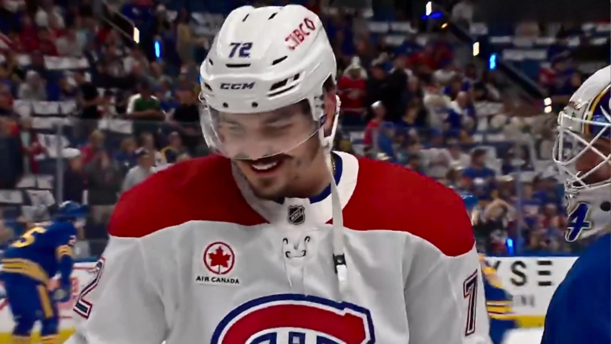 Montreal Canadiens defenseman Arber Xhekaj with a big smile during warmups against the Buffalo Sabres while chatting with goaltender Alex Lyon.