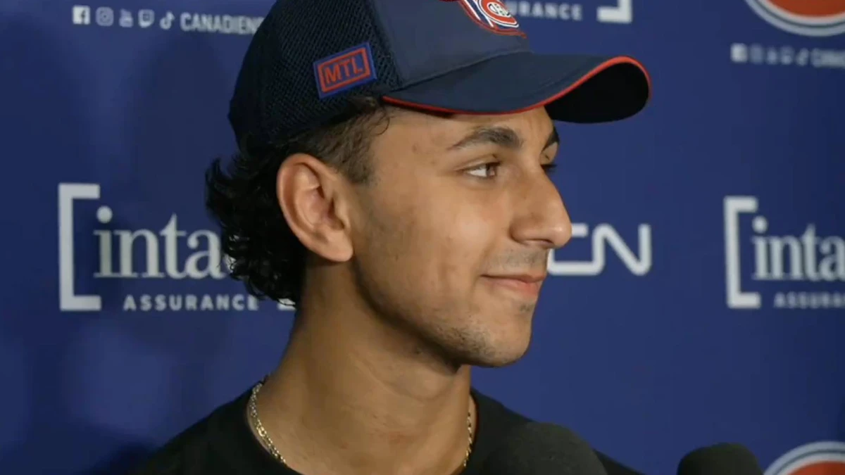 Montreal Canadiens prospect Michael Hage speaks to the media during development camp.