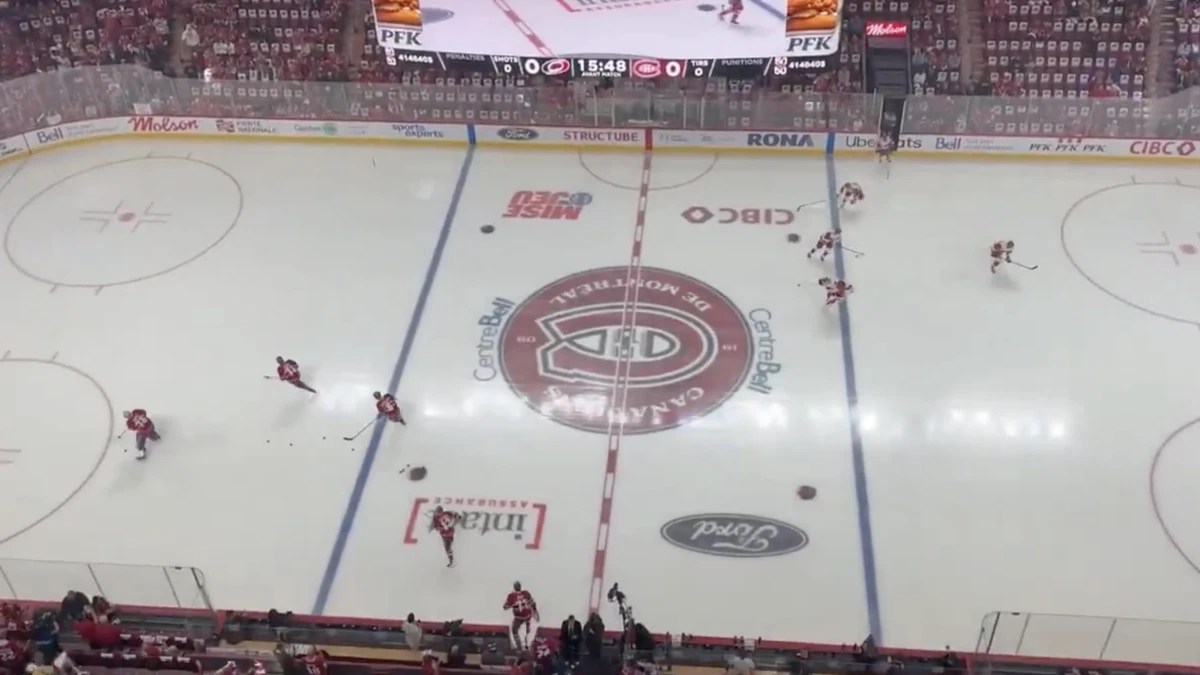 Montreal Canadiens and Carolina Hurricanes players take the ice at the Bell Centre during the NHL playoffs.