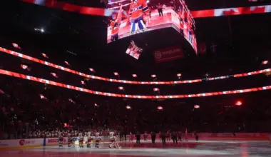Carolina Hurricanes and Montreal Canadiens players during the National Anthem at the Bell Centre.