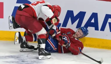 Carolina Hurricanes left wing William Carrier (28) checks Montreal Canadiens defenseman Kaiden Guhle (21) during the third period in game four of the Eastern Conference Final of the 2026 Stanley Cup Playoffs at Bell Centre.