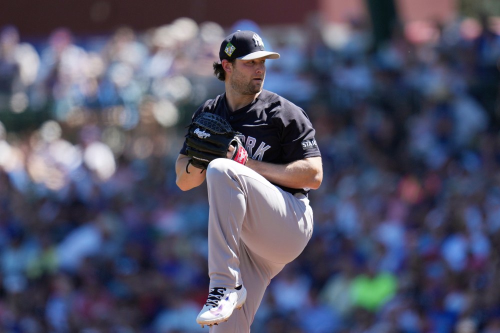FILE - New York Yankees starting pitcher Gerrit Cole throws against the Chicago Cubs during the first inning of a spring training baseball game, Tuesday, March 24, 2026, in Mesa, Ariz. (AP Photo/Ross D. Franklin, File)