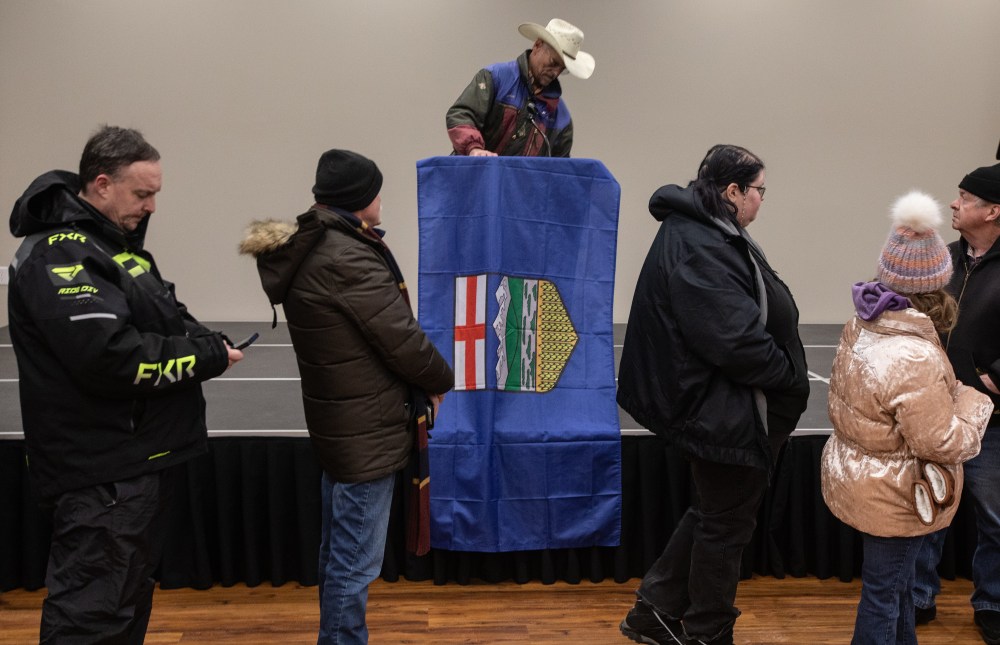 People line up to sign a petition that seeks to have a referendum on Alberta separation, in Stony Plain, Alta., Thursday, Jan. 22, 2026. THE CANADIAN PRESS/Jason Franson