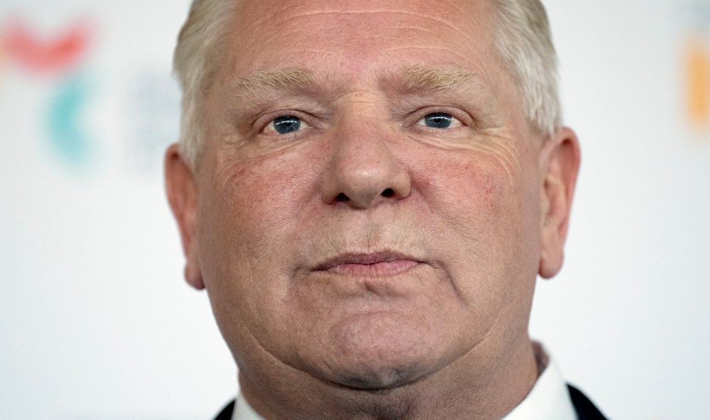 Ontario Premier Doug Ford speaks with reporters before attending an event in Ottawa, Monday, April 20, 2026. THE CANADIAN PRESS/Adrian Wyld