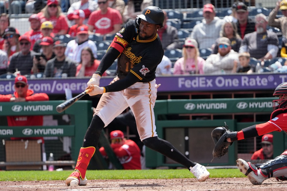Pittsburgh Pirates' Oneil Cruz fouls a pitch from Cincinnati Reds' Chase Burns off his foot in the sixth inning of a baseball game in Pittsburgh, Sunday, May 3, 2026. (AP Photo/Tom E. Puskar)