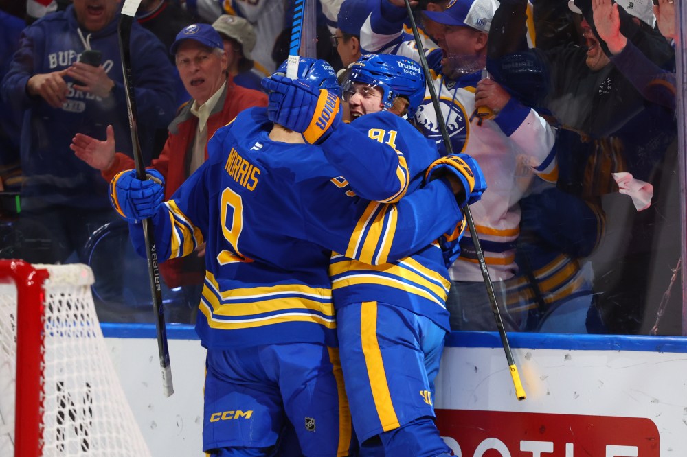 Buffalo Sabres right wing Josh Doan, right, celebrates his goal with center Josh Norris, during the first period in Game 1 of a second-round NHL hockey Stanley Cup playoff series, Wednesday, May 6, 2026, in Buffalo, N.Y. (AP Photo/Jeffrey T. Barnes)