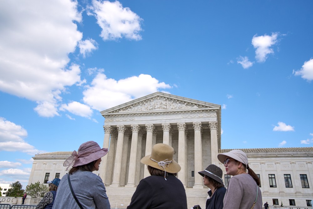 People visit the Supreme Court, Thursday, April 30, 2026, in Washington. (AP Photo/Jacquelyn Martin)