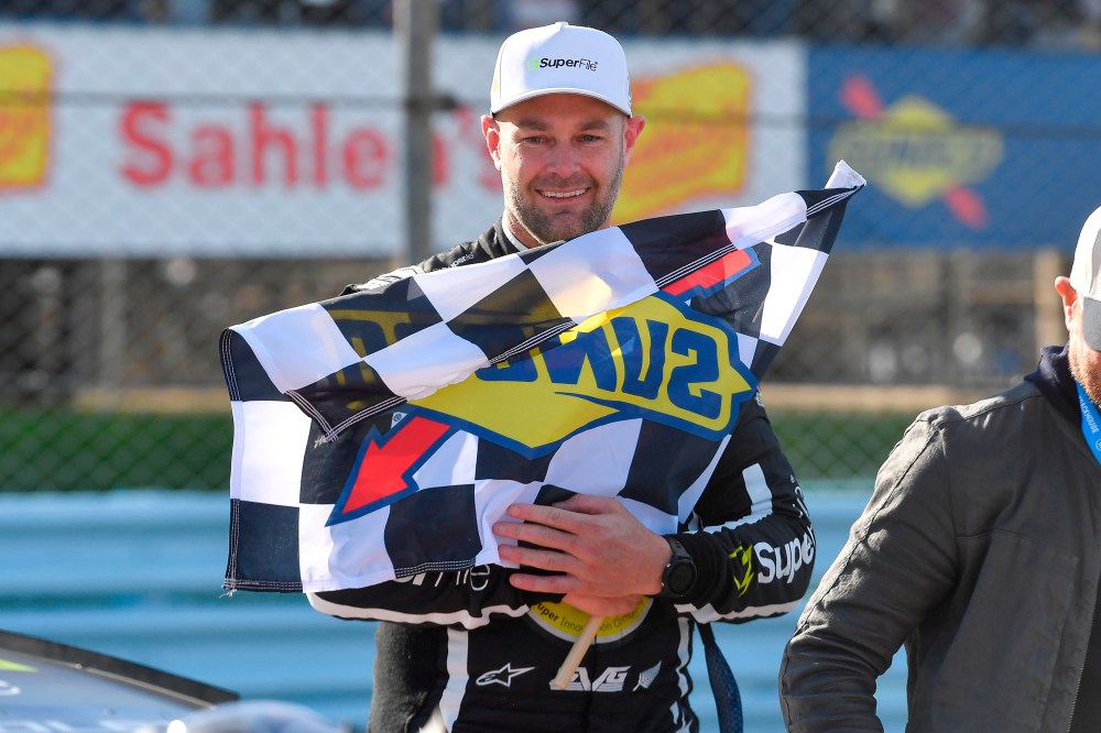 Shane Van Gisbergen celebrates after winning a NASCAR Cup Series auto race, Sunday, May 10, 2026, in Watkins Glen, N.Y. (Photo/Adrian Kraus)