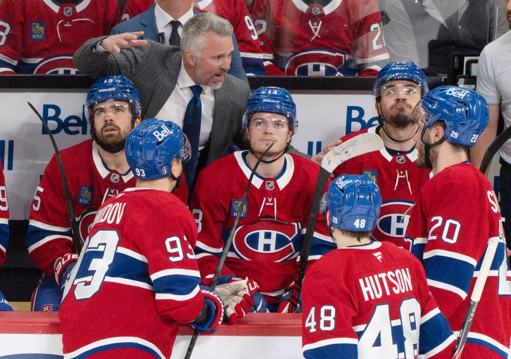 Montreal Canadiens head coach Martin St. Louis talks to his team during second period, second round, game 4, NHL playoff action in Montreal on Tuesday, May 12, 2026. THE CANADIAN PRESS/Christinne Muschi