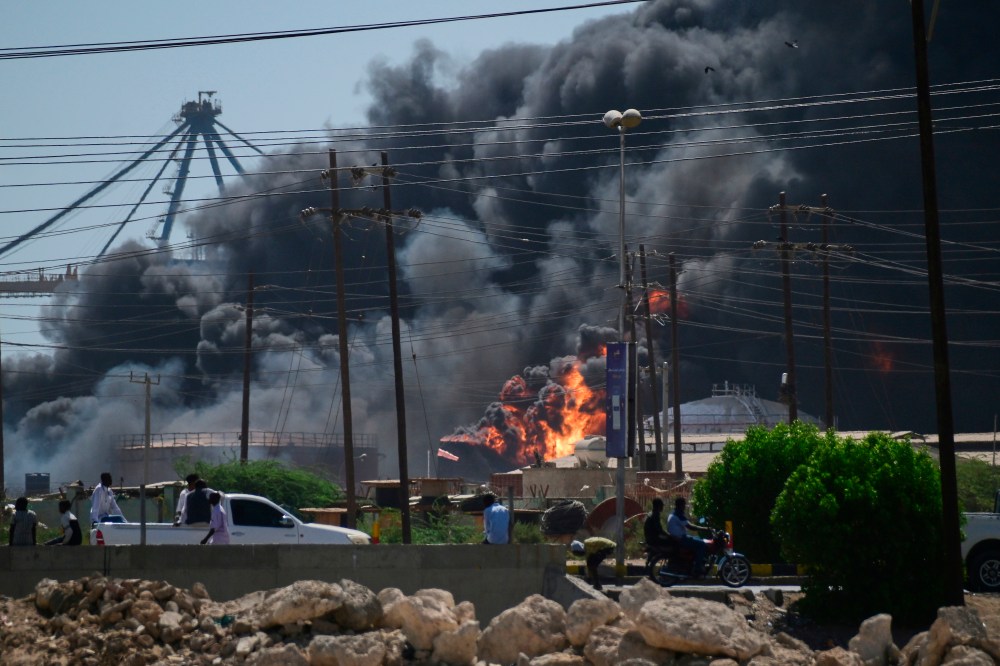 FILE - Smoke billows after drone strikes by the paramilitary Rapid Support Forces (RSF) targeted the northern port in the Red Sea city of Port Sudan, Sudan, May 6, 2025. (AP Photo, File)