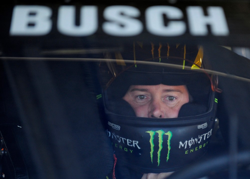 FILE - Kyle Busch waits in his car before practice for Sunday's NASCAR Sprint Cup series Coca-Cola 600 auto race at Charlotte Motor Speedway in Concord, N.C., Saturday, May 25, 2013. (AP Photo/Mike McCarn, File, File)