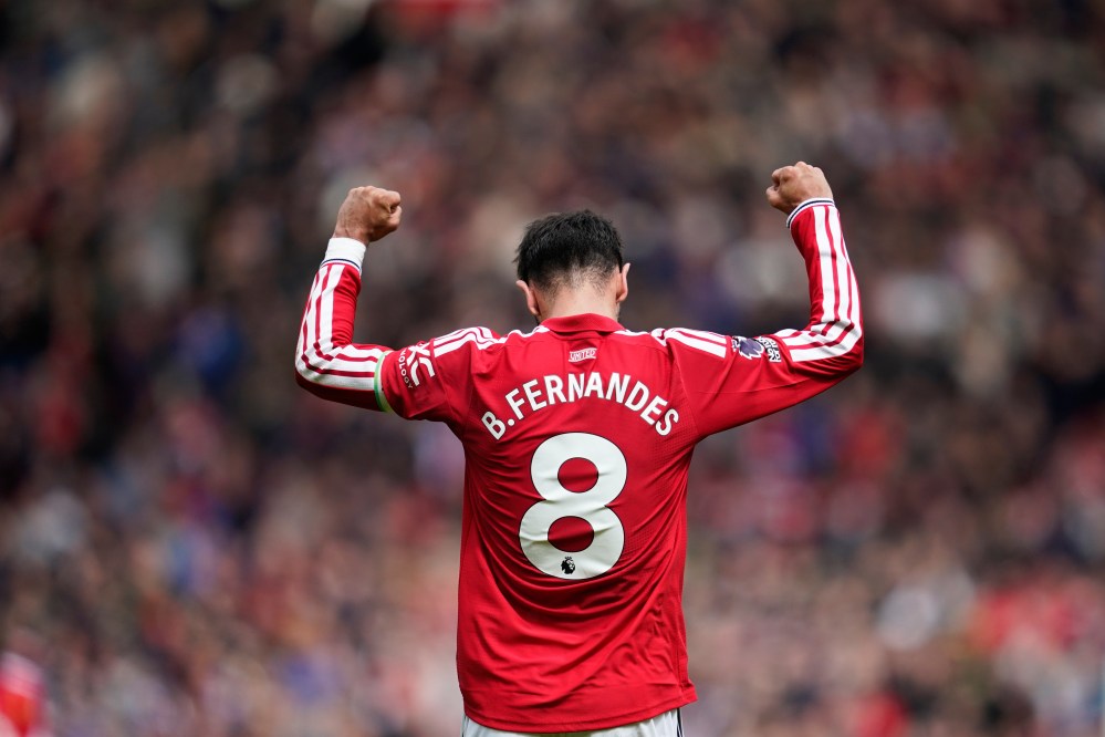 Manchester United's Bruno Fernandes celebrates their victory at the English Premier League soccer match between Manchester United and Nottingham Forest in Manchester, England, Sunday, May 17, 2026. (AP Photo/Dave Thompson)