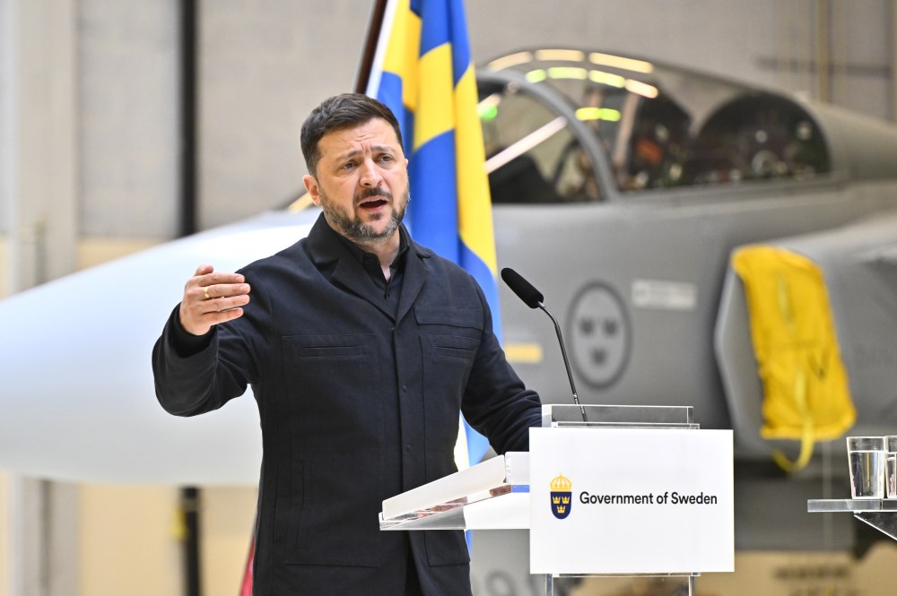 Ukraine's President Volodymyr Zelenskyy and Sweden's Prime Minister Ulf Kristersson, not seen, give a joint news conference at the F16 air flotilla in Uppsala, Sweden, Thursday, May 28, 2026. (Christine Olsson/TT News Agency via AP)