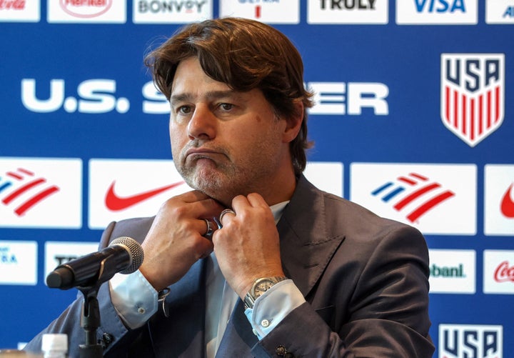 U.S. coach Mauricio Pochettino said his agent may have spoken with AC Milan and he also may have had a casual conversation with the Italian club but he remains open to staying with the American national team after the World Cup.