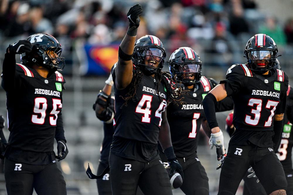 Ottawa Redblacks defensive lineman Luiji Vilain (44) celebrates a successful sack against the Montreal Alouettes during first half CFL pre-season action in Ottawa, on Friday, May 29, 2026. THE CANADIAN PRESS/Spencer Colby