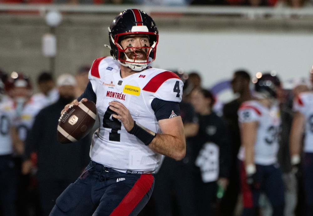 Montreal Alouettes quarterback James Morgan searches for an open receiver during second half CFL pre-season football action against the Ottawa Redblacks in Montreal Friday May 22, 2026. THE CANADIAN PRESS/Peter McCabe