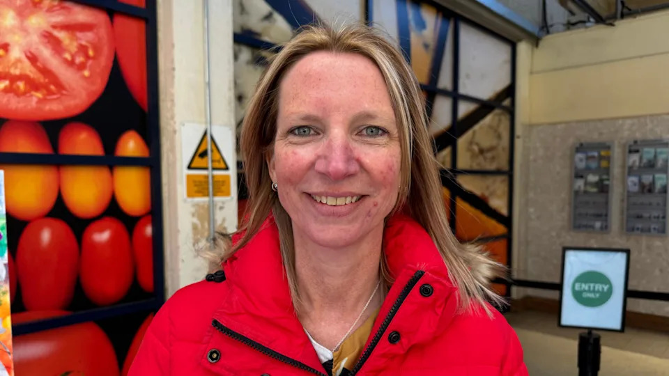 Nikki Roberts, CEO of Surrey Coalition of Disabled People, looks at the camera