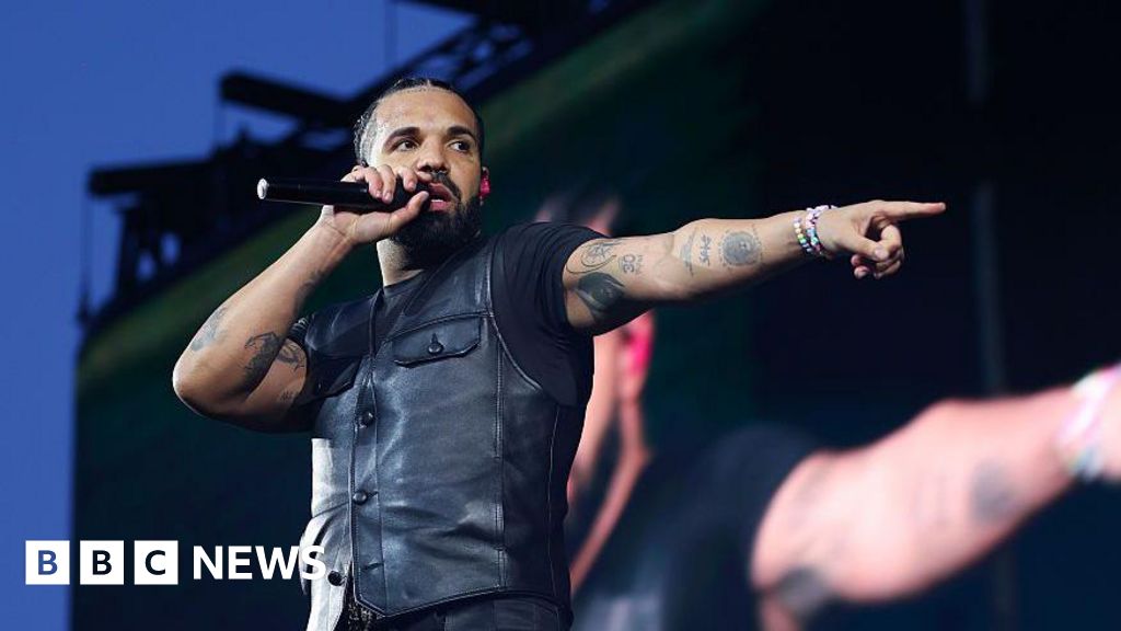 Drake surprise drops three albums and mentions rapper feud - BBC