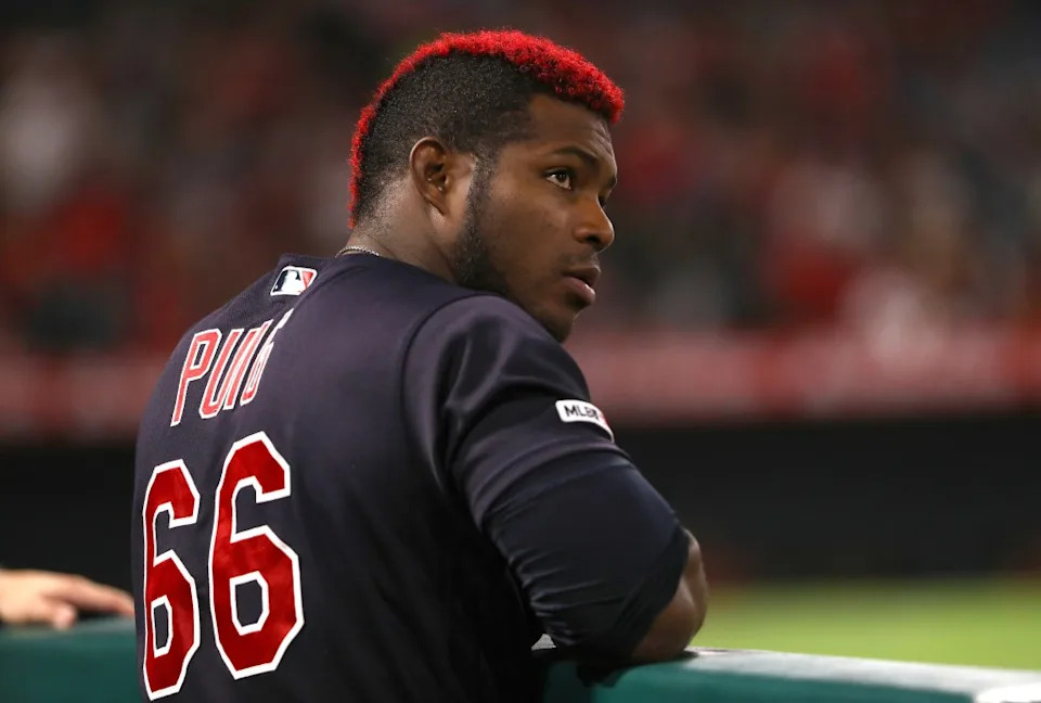 Yasiel Puig #66 of the <a class="link " href="https://sports.yahoo.com/mlb/teams/cleveland/" data-i13n="sec:content-canvas;subsec:anchor_text;elm:context_link" data-ylk="slk:Cleveland Indians;sec:content-canvas;subsec:anchor_text;elm:context_link;itc:0" data-yga="{"yLinkElement":"context_link","yModuleName":"content-canvas","yLinkText":"Cleveland Indians","ySubModuleName":"anchor_text","yHasCommerce":false}">Cleveland Indians</a> looks on during the fourth inning of the MLB game between the Cleveland Indians and the <a class="link " href="https://sports.yahoo.com/mlb/teams/la-angels/" data-i13n="sec:content-canvas;subsec:anchor_text;elm:context_link" data-ylk="slk:Los Angeles Angels;sec:content-canvas;subsec:anchor_text;elm:context_link;itc:0" data-yga="{"yLinkElement":"context_link","yModuleName":"content-canvas","yLinkText":"Los Angeles Angels","ySubModuleName":"anchor_text","yHasCommerce":false}">Los Angeles Angels</a> at Angel Stadium of Anaheim on September 09, 2019 in Anaheim, California. Getty Images