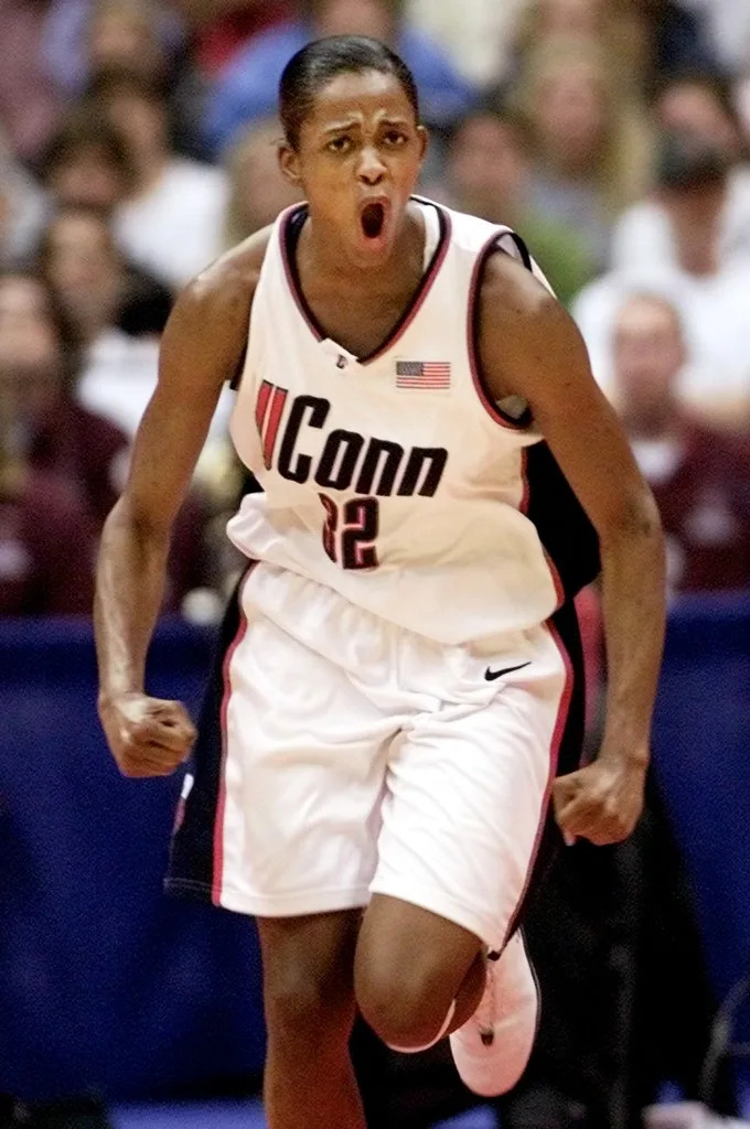 University of Connecticut forward Swin Cash reacts after scoring against Oklahoma in the first half at the 2002 NCAA Women’s national basketball final in San Antonio, Texas, March 31, 2002. REUTERS
