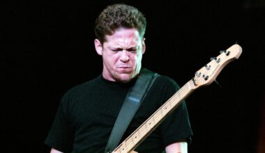 Jason Newsted performing onstage with Metallica in 1999