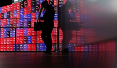 Shares mixed, dollar gains as Iran talks teeter