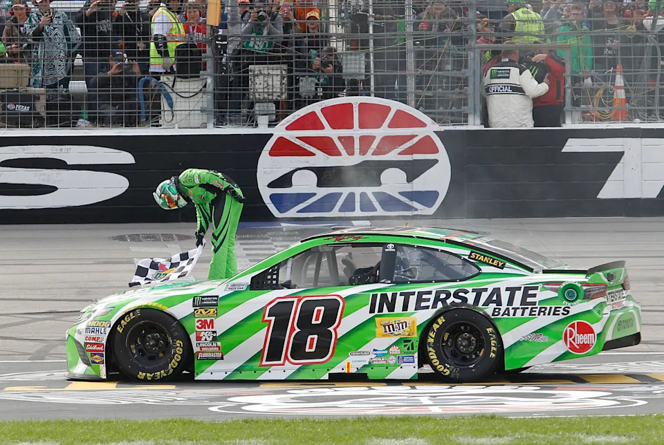 Kyle Busch (18) bows after winning the O'Reilly Auto Parts 500 race at Texas Motor Speedway April 8, 2018 in Fort Worth, Texas. (Ross Hailey/Fort Worth Star-Telegram/Tribune News Service via Getty Images)