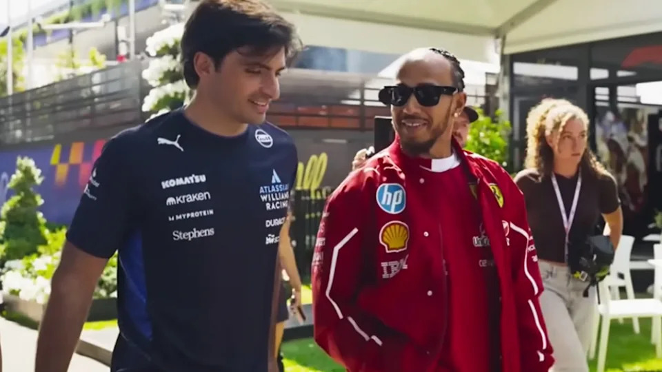 Two drivers smiling and talking in Formula 1: Drive to Survive