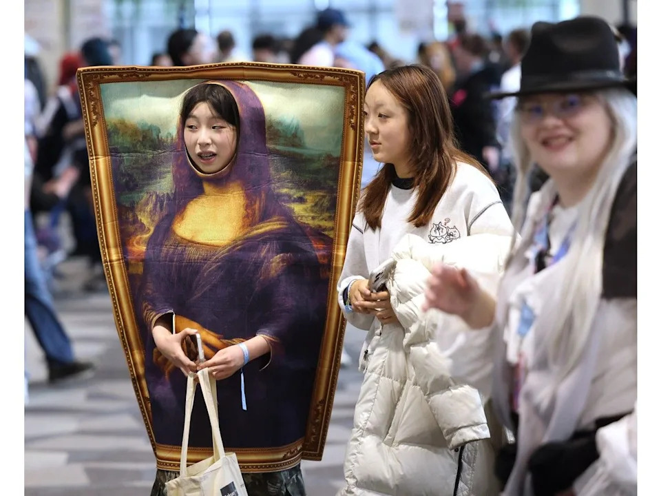 Visitors take in Otafest at the Telus Convention Centre in downtown Calgary on Saturday.