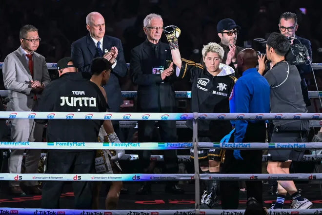 Naoya Inoue (3rd R) and Junto Nakatani (3rd L) arrive for their super bantamweight championship boxing contest at Tokyo Dome in Tokyo on May 2, 2026. (Photo by Yuichi YAMAZAKI / AFP via Getty Images)