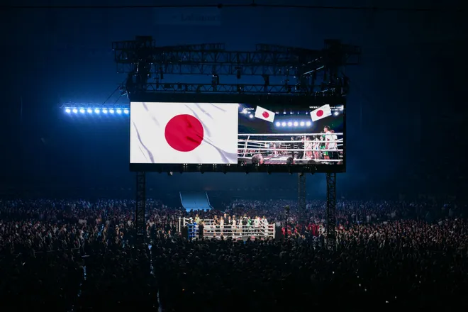 People gather in the ring before the Takuma Inoue and Kazuto Ioka WBC Bantamweight Title Match boxing contest at Tokyo Dome in Tokyo on May 2, 2026. (Photo by Yuichi YAMAZAKI / AFP via Getty Images)