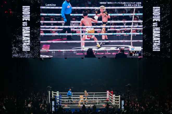 Naoya Inoue (R) fights Junto Nakatani during their super bantamweight championship boxing contest at Tokyo Dome in Tokyo on May 2, 2026. (Photo by Yuichi YAMAZAKI / AFP via Getty Images)