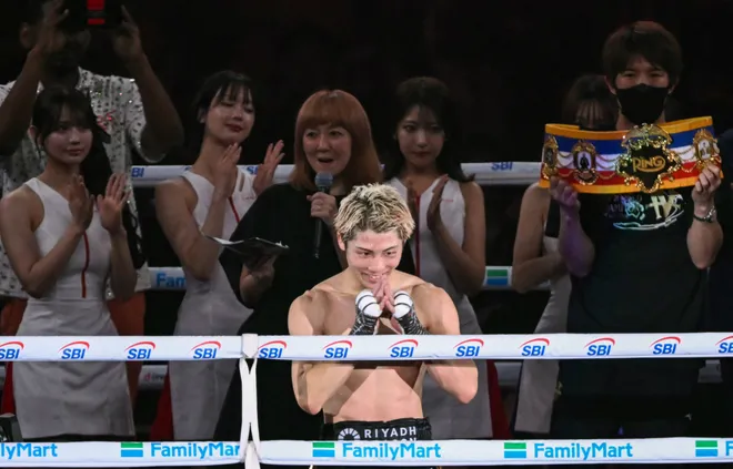 Naoya Inoue (C) celebrates after defeating Junto Nakatani in their super bantamweight championship boxing contest at Tokyo Dome in Tokyo on May 2, 2026. (Photo by Yuichi YAMAZAKI / AFP via Getty Images)