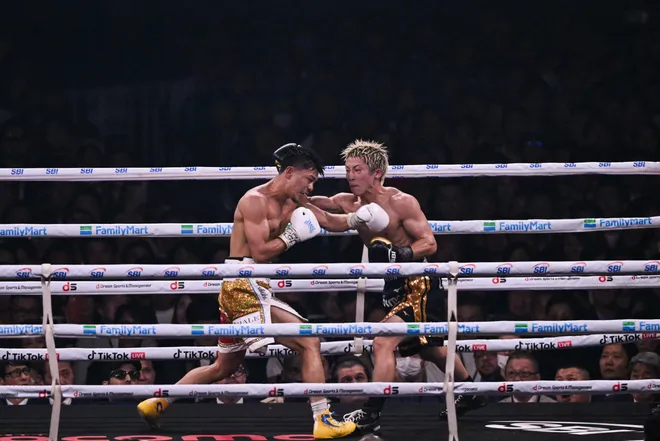 Naoya Inoue (R) fights Junto Nakatani during their Super bantamweight championship contest at Tokyo Dome in Tokyo on May 2, 2026. (Photo by Yuichi YAMAZAKI / AFP via Getty Images)