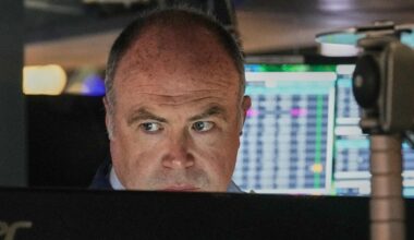 Apple leads Wall Street toward more records as oil prices pull back
