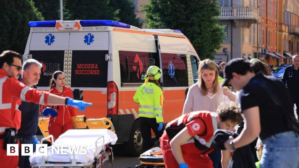 Man ploughs car into crowd in Italy before trying to stab them - BBC