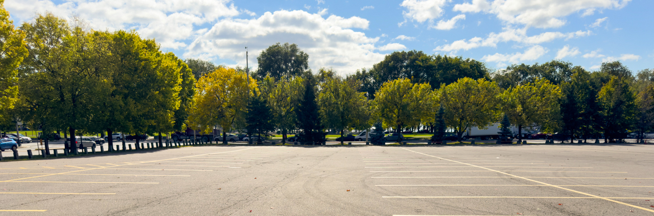 A image of the parking lot and parkland at Gore Park West