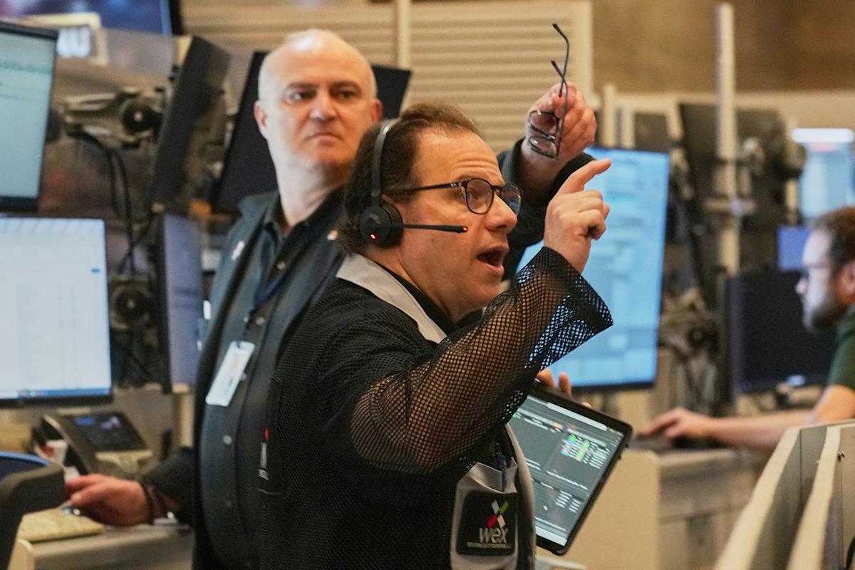 Wall Street falls from its records and oil prices jump after fighting flares in the Middle East