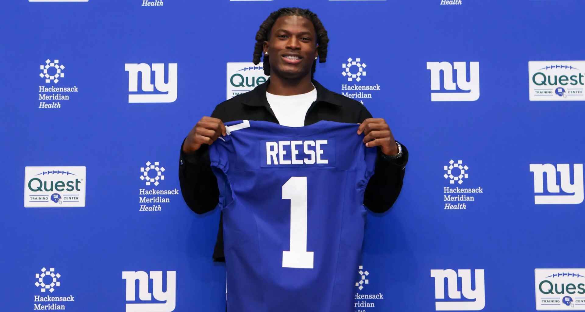 Ohio State football first round NFL draft picks pose in new uniforms