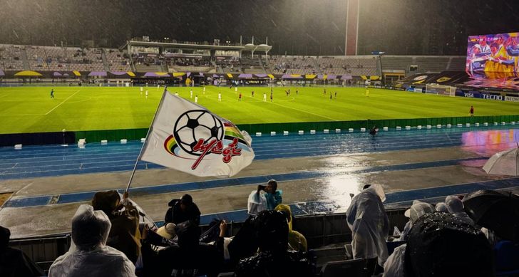 A spectator at the Suwon Sports Complex waves a flag bearing the emblem of North Korea’s Naegohyang Women’s Football Club during the team’s semifinal match against South Korea's Suwon FC Women, Wednesday. Courtesy of NK News