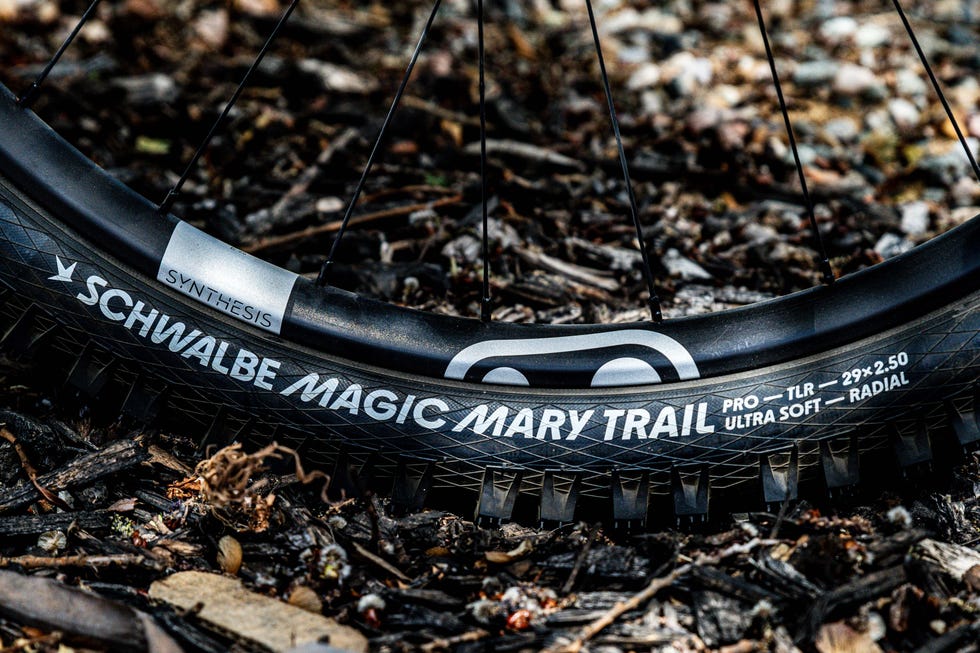 Close-up of a mountain bike tire positioned on the ground. Close-up of a mountain bike tire positioned on the ground.