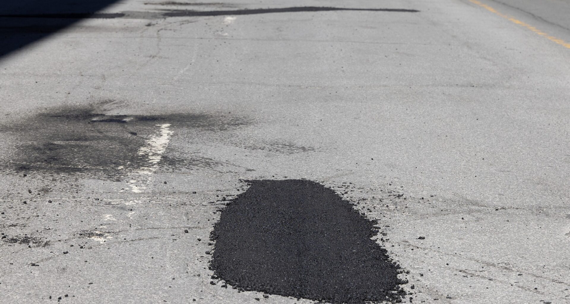 A freshly filled pothole.