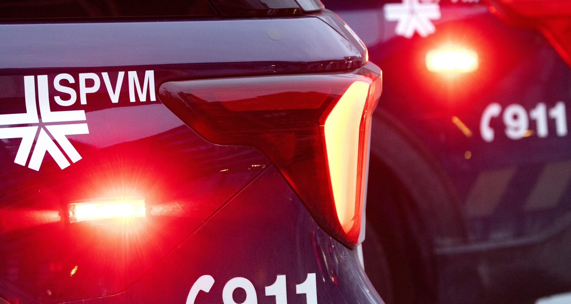 Montreal police cars at night.