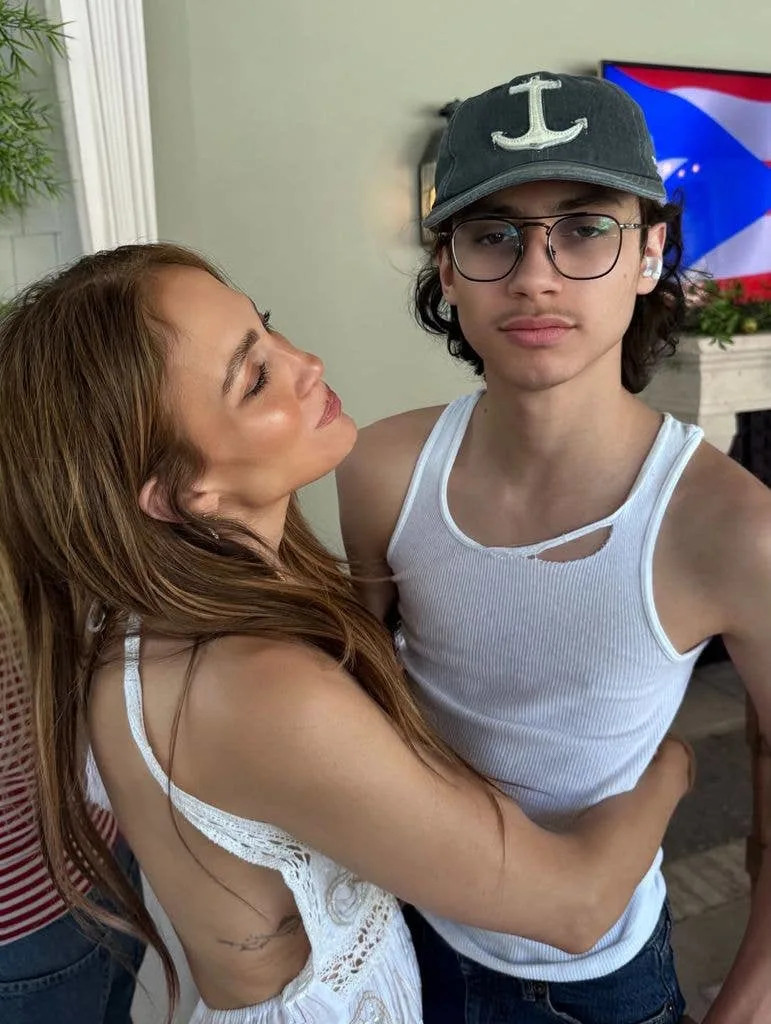 photo of jennifer lopez hugging son max